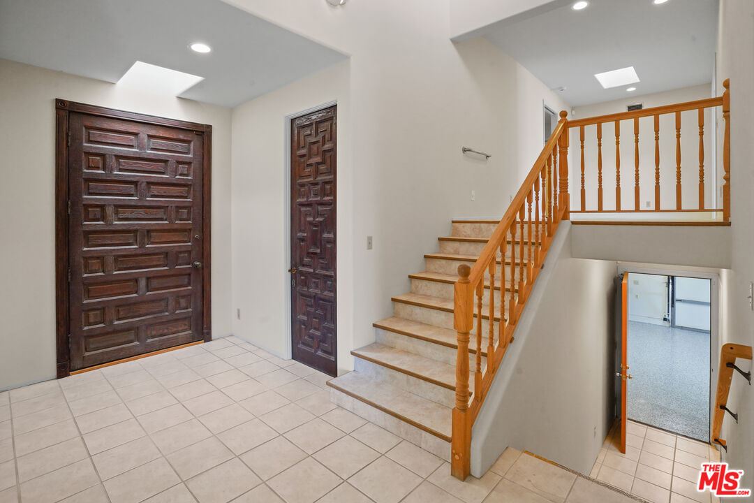 6405 Sycamore Meadows Drive Malibu, CA 90265 - Photo 9 of 26 a view of an entryway with staircase