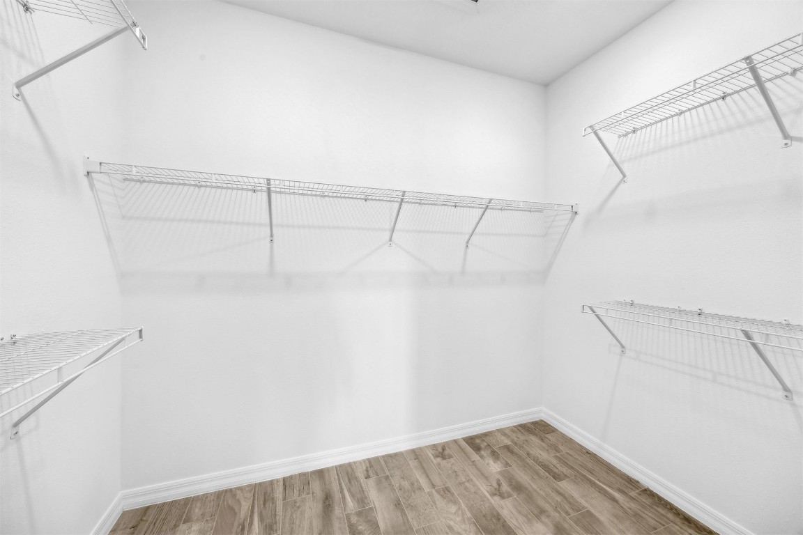 540 Jubilee Circle Yulee, FL 32097 - Photo 16 of 42 a view of a room with racks on the wall