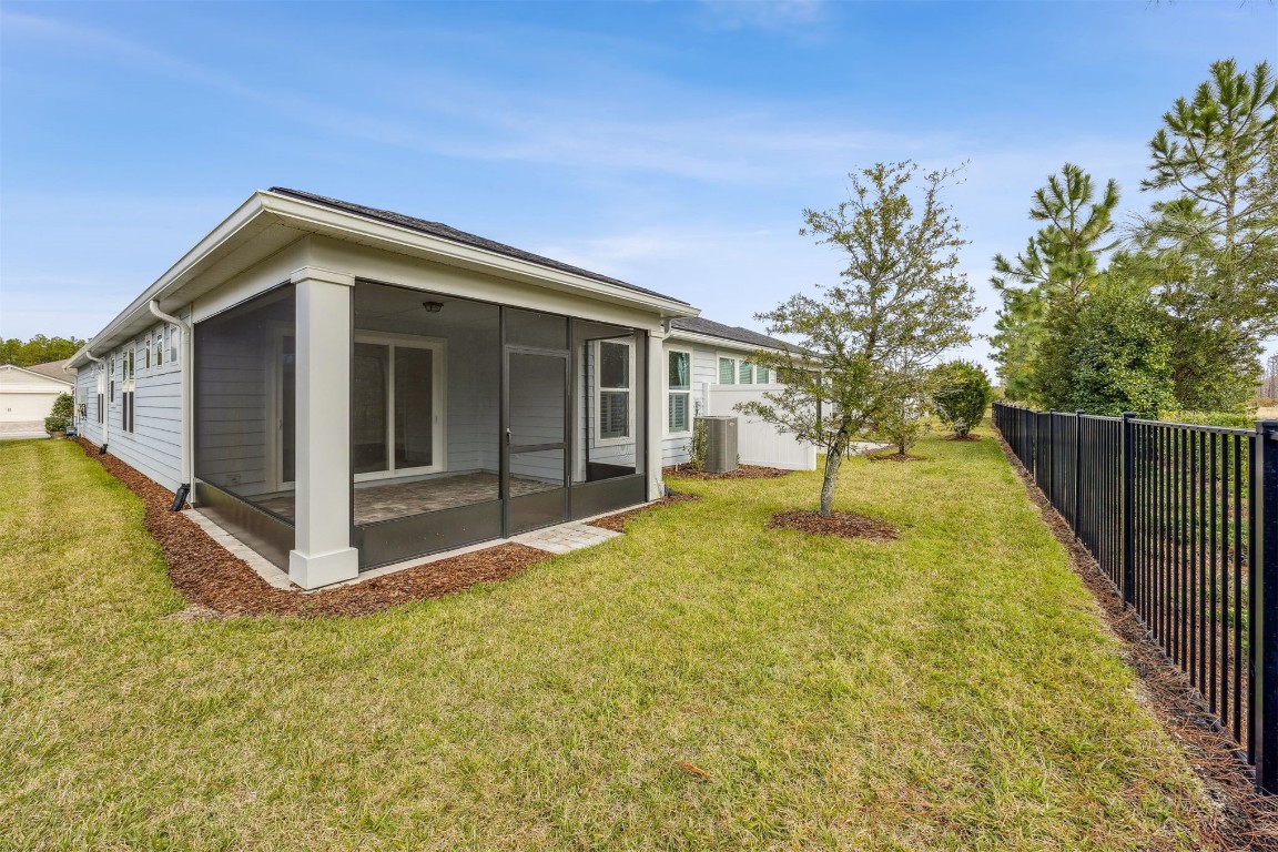 540 Jubilee Circle Yulee, FL 32097 - Photo 23 of 42 a view of a house with a yard