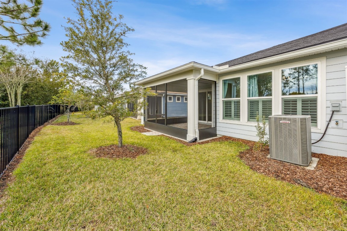 540 Jubilee Circle Yulee, FL 32097 - Photo 24 of 42 a view of a house with backyard and sitting area