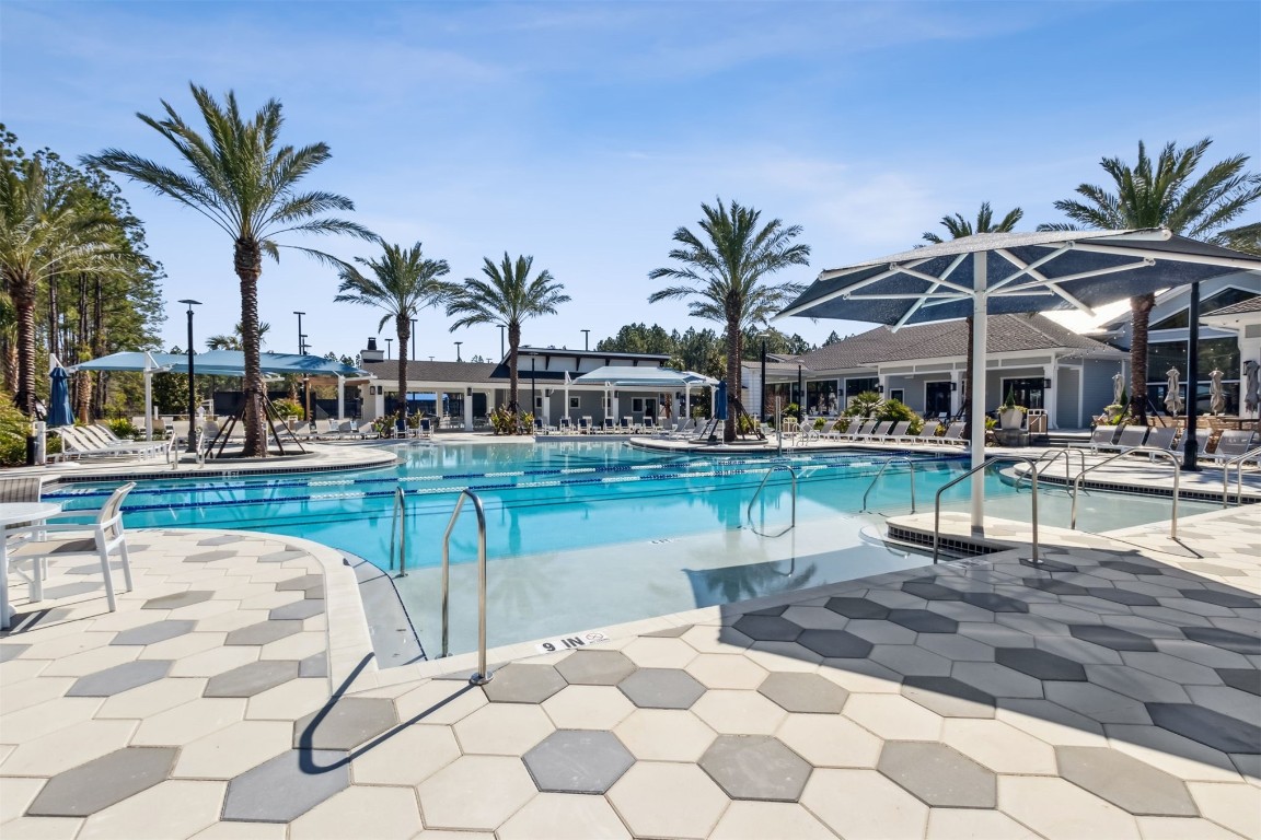 540 Jubilee Circle Yulee, FL 32097 - Photo 29 of 42 a view of a swimming pool with a patio