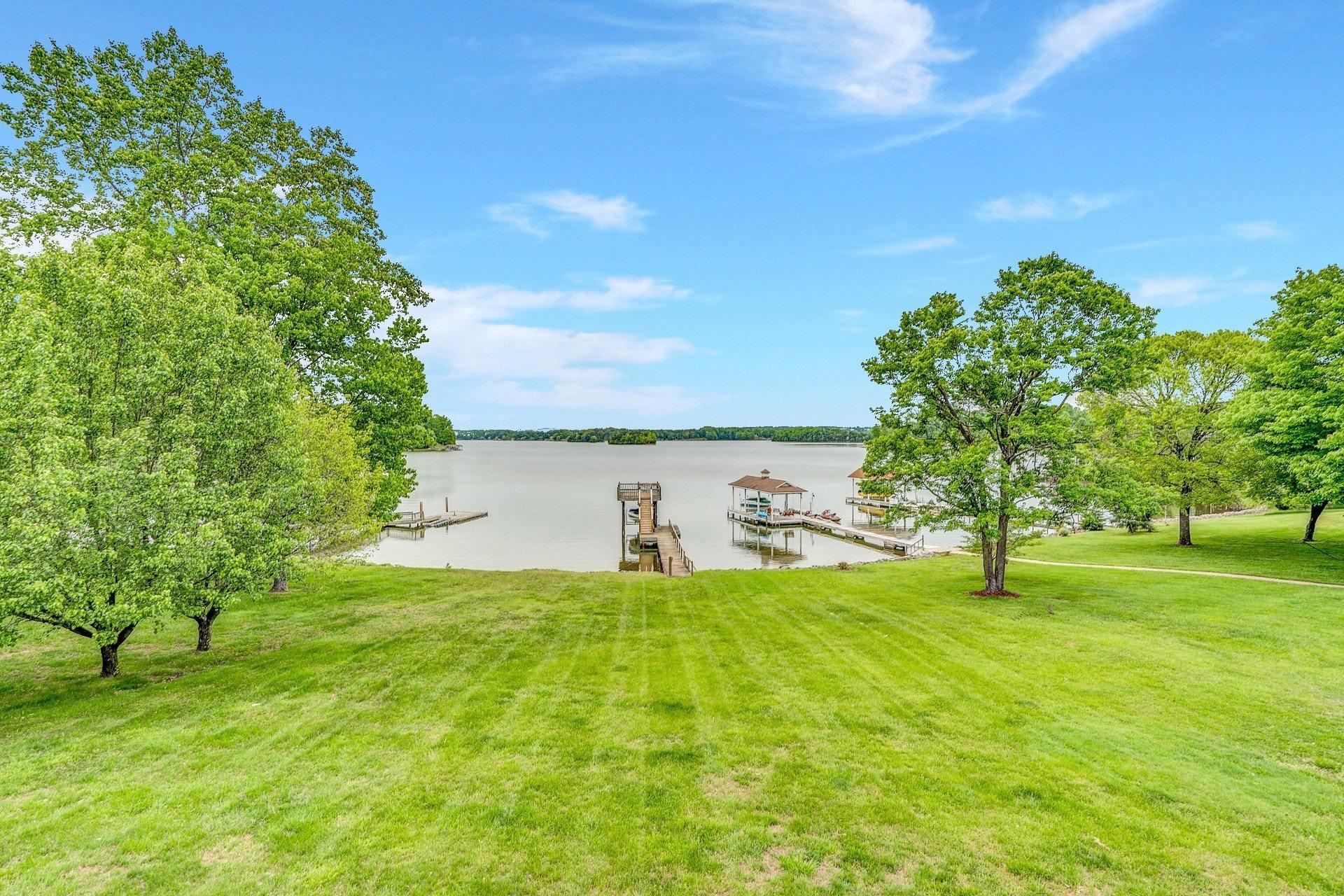 1047 Highland Lake Road Union Hall, VA 24176 - Photo 19 of 39 a view of a big yard with large trees