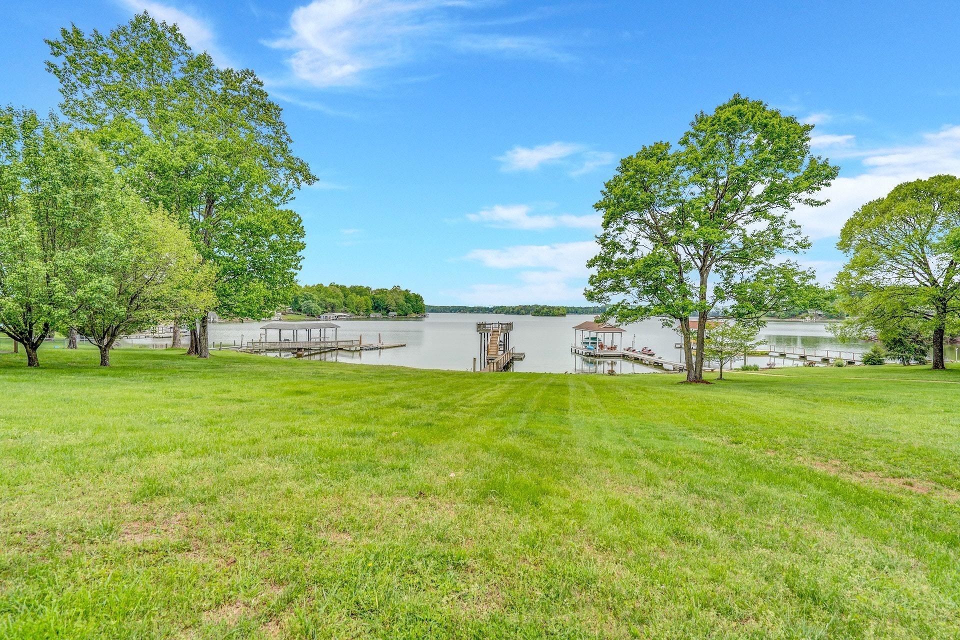 1047 Highland Lake Road Union Hall, VA 24176 - Photo 3 of 39 a view of a garden with large trees