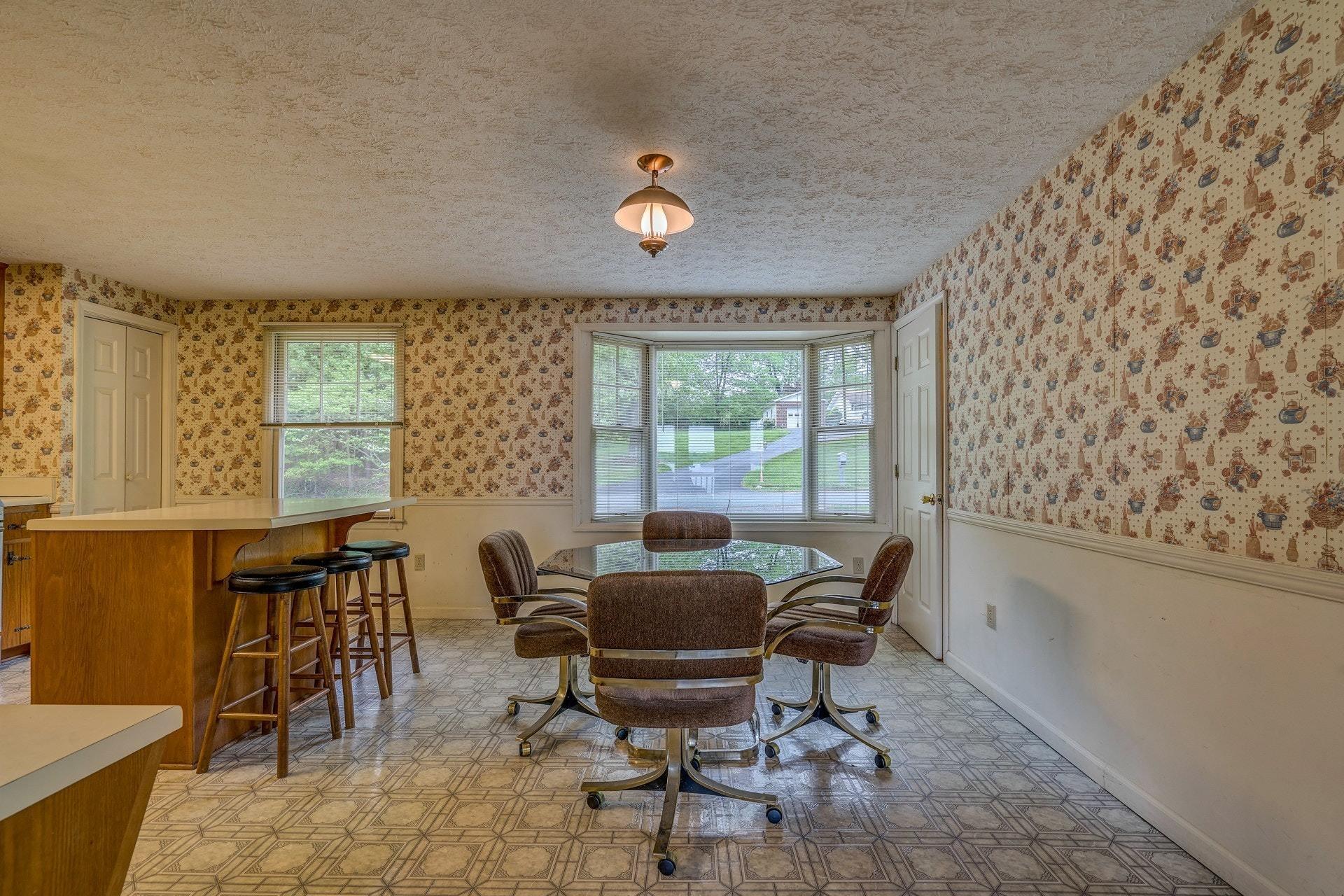 1047 Highland Lake Road Union Hall, VA 24176 - Photo 22 of 39 a living room with furniture and a window