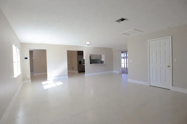 a view of a livingroom with wooden floor