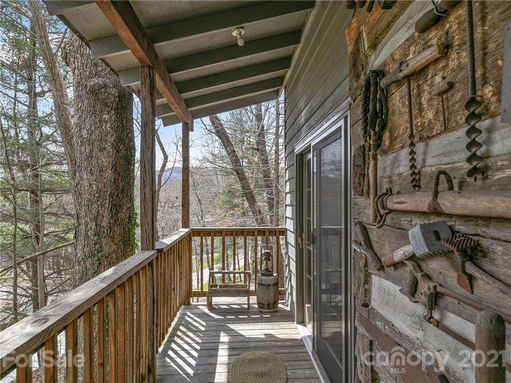 837 County Road Waynesville, NC 28785 - Photo 3 of 23 a view of balcony with wooden floor