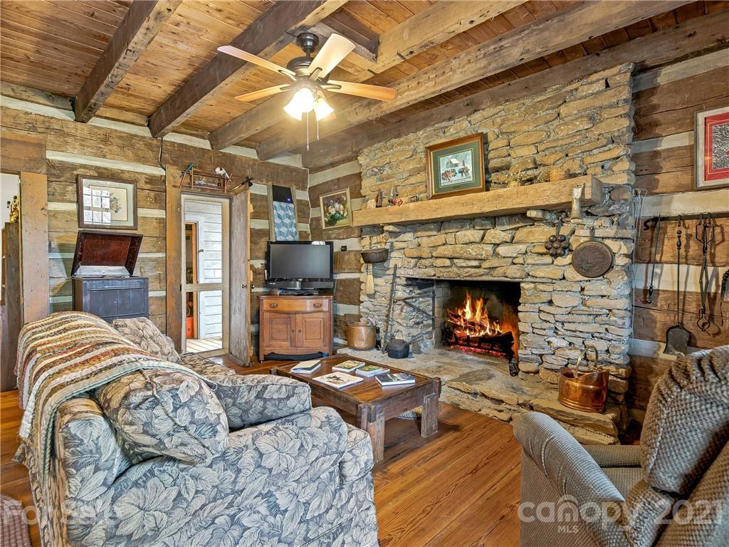 837 County Road Waynesville, NC 28785 - Photo 4 of 23 a living room with furniture and a fireplace