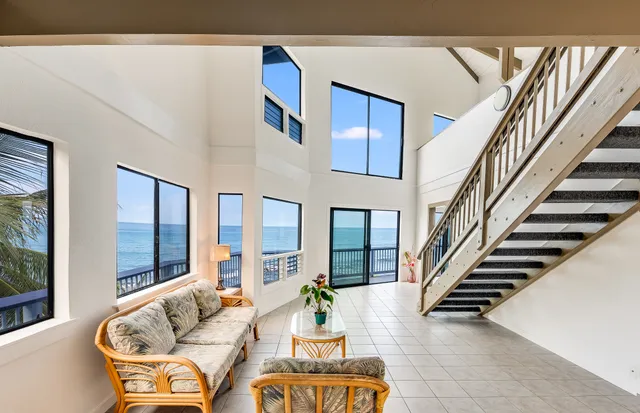 a view of living room filled with furniture