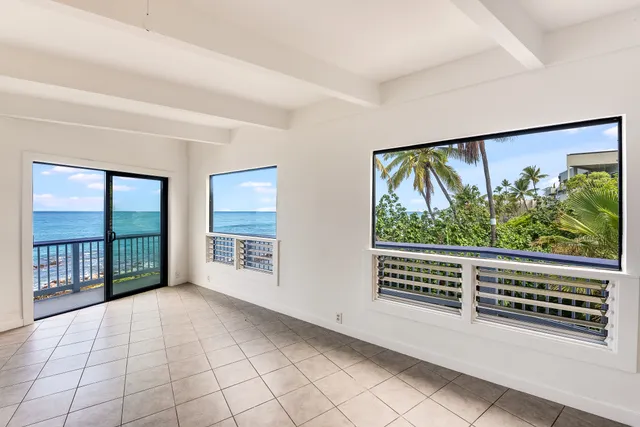 a view of front door with furniture and garden