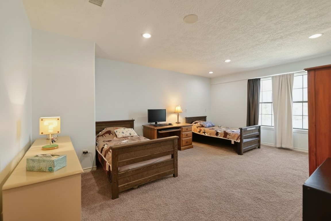299 North Ghost Branch Road Trinity, TX 75862 - Photo 20 of 48 Huge secondary room, can serve as bunk room or gameroom, you choose!