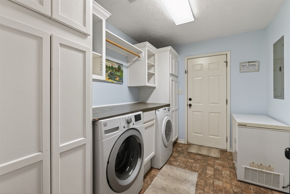 299 North Ghost Branch Road Trinity, TX 75862 - Photo 24 of 48 Large in-house utility room, with extra storage and room for more.