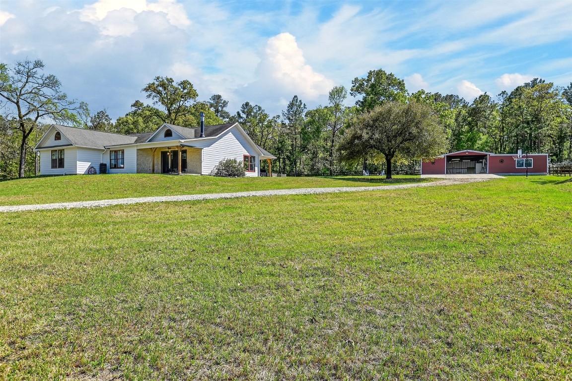 299 North Ghost Branch Road Trinity, TX 75862 - Photo 3 of 48 Farmhouse and Shop combo with sprawling yard.