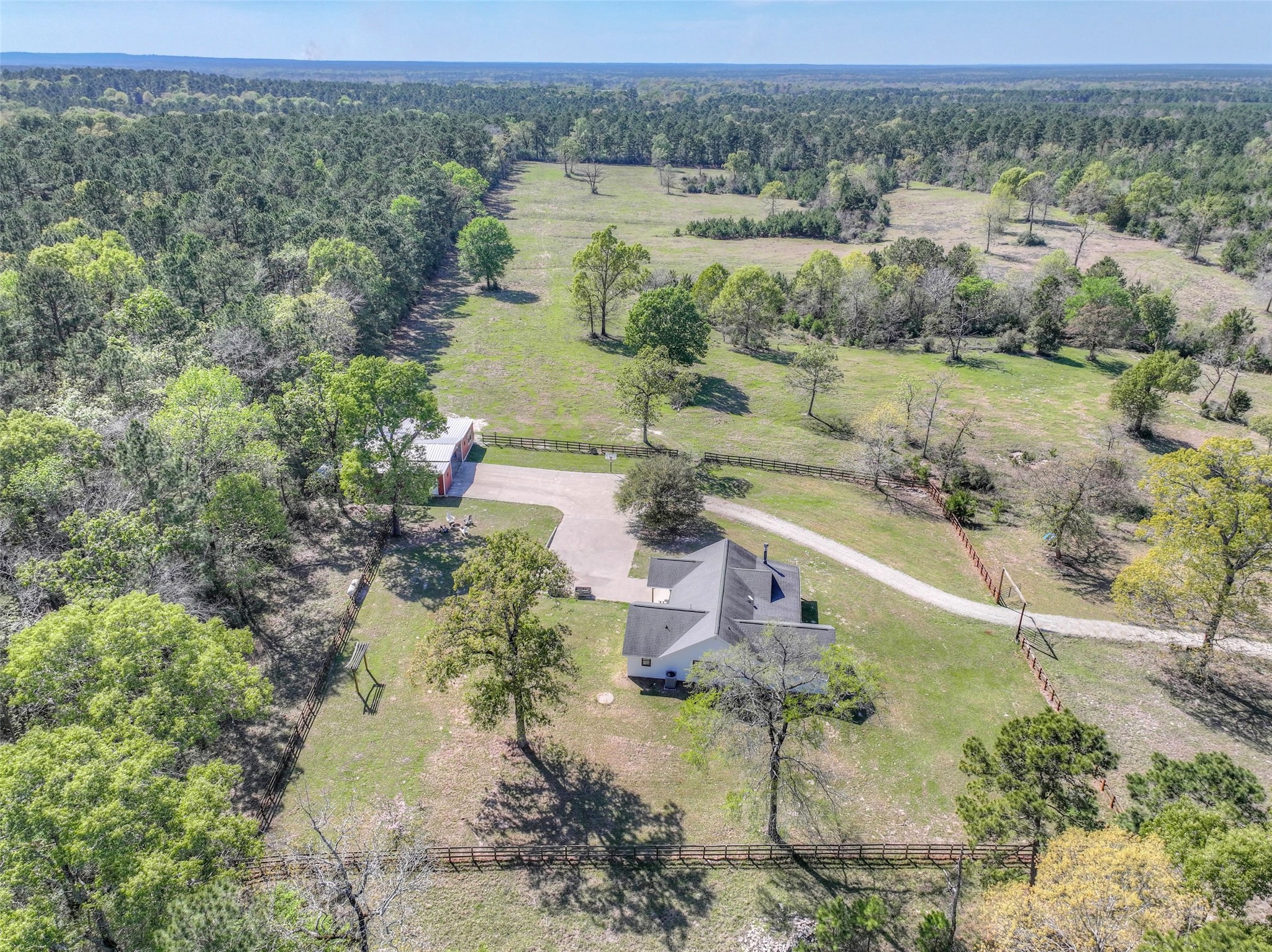 299 North Ghost Branch Road Trinity, TX 75862 - Photo 32 of 48 Sprawling cross-fenced acreage surrounded by heavily wooded neighboring properties.