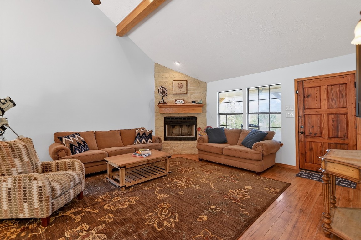 299 North Ghost Branch Road Trinity, TX 75862 - Photo 7 of 48 Floor-to-ceiling stone fireplace.