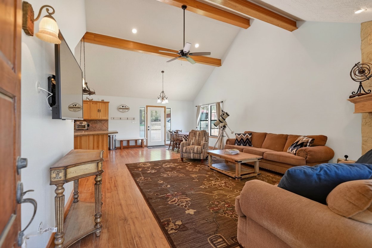 299 North Ghost Branch Road Trinity, TX 75862 - Photo 8 of 48 Welcoming family room open to kitchen and breakfast area.