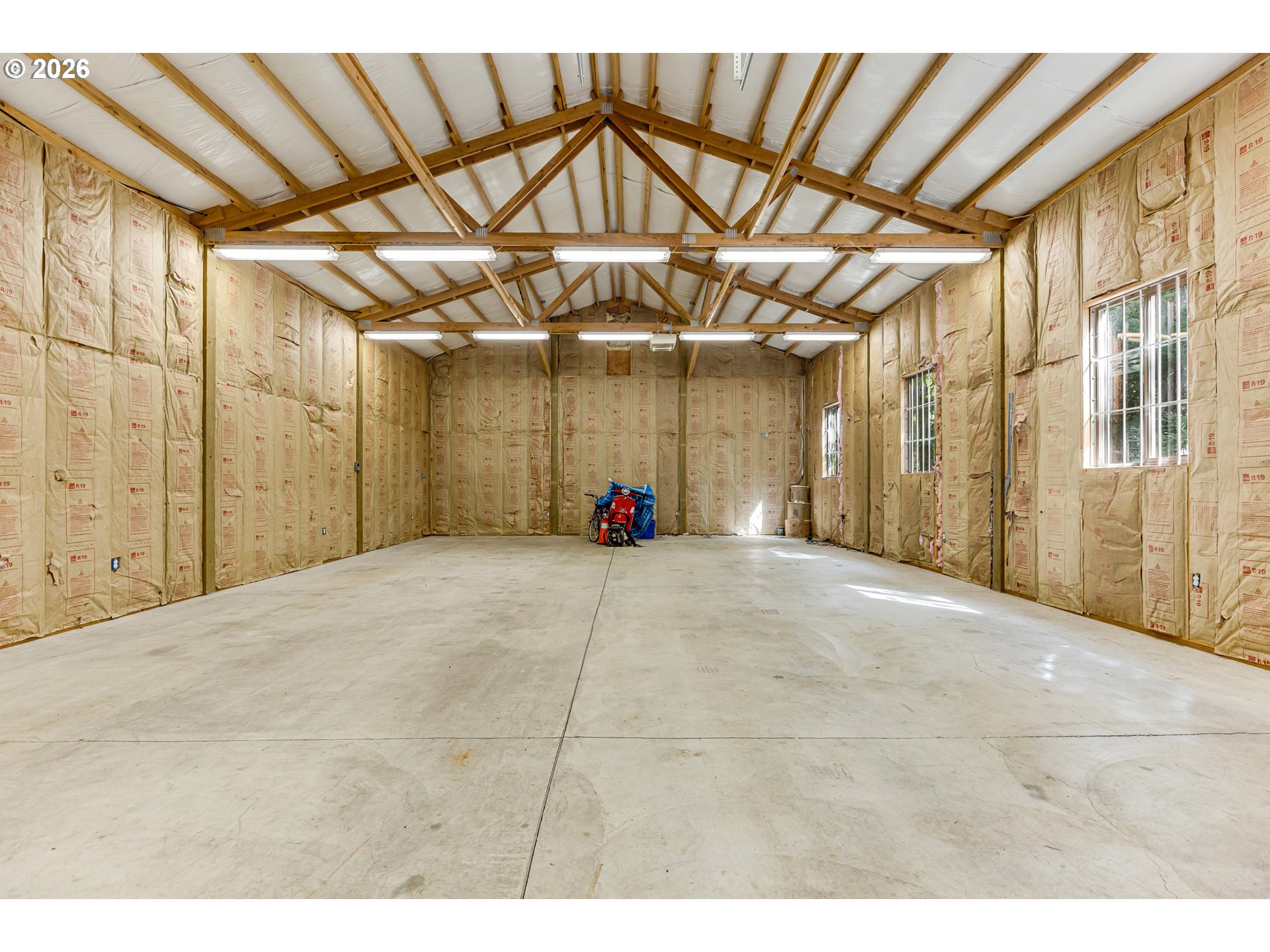 16007 Southeast Monner Road Happy Valley, OR 97086 - Photo 9 of 14 a view of a room with wooden walls