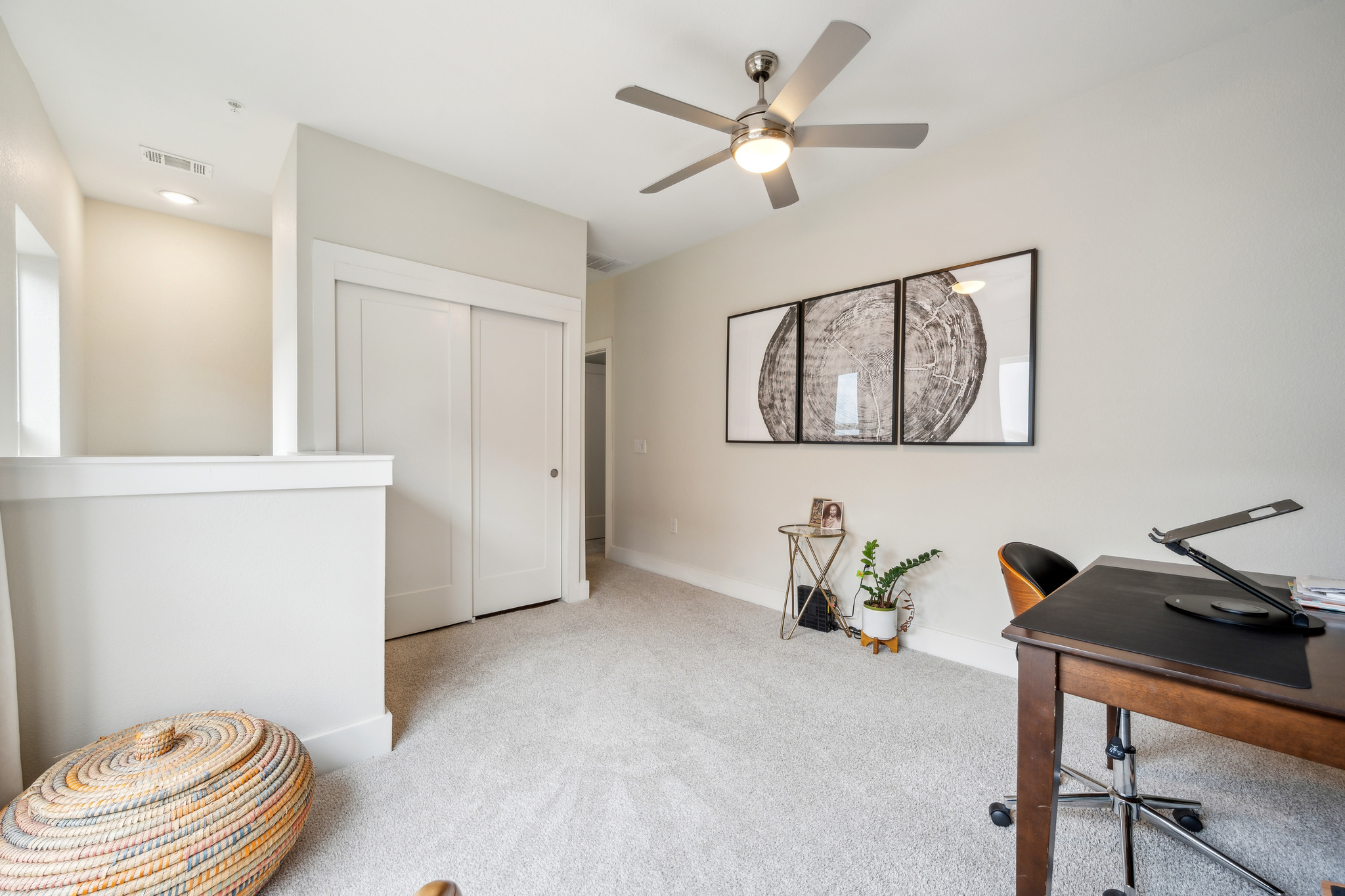 2827 Manor Road, Unit 3104 Austin, TX 78722 - Photo 16 of 30 A well-lit area provides versatile space, ideal for a home office or creative retreat.