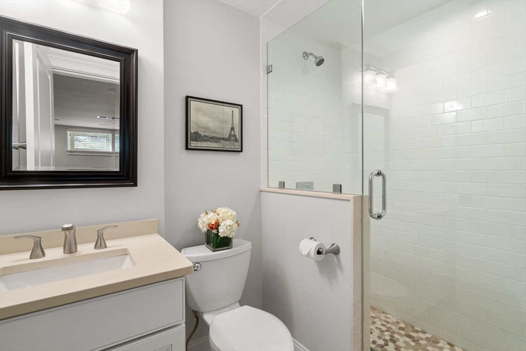 33 Monument Square, Unit 1 Boston, MA 02129 - Photo 15 of 19 a bathroom with a sink toilet and shower