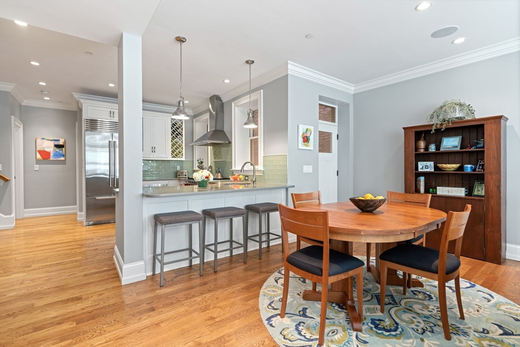 33 Monument Square, Unit 1 Boston, MA 02129 - Photo 8 of 19 a view of a dining room with furniture