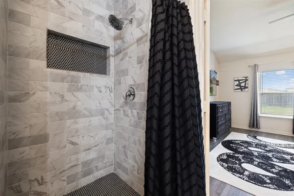 a bathroom with a sink and a window