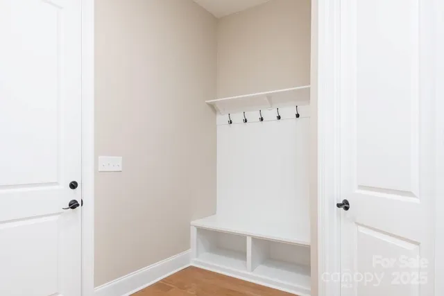 a view of a garden with a building in the background