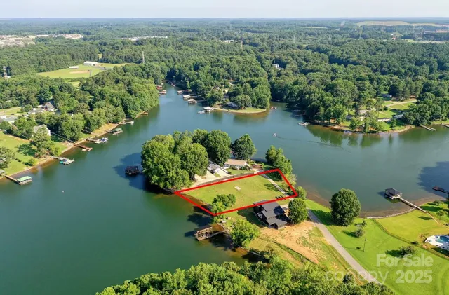 an aerial view of lake residential house with outdoor space