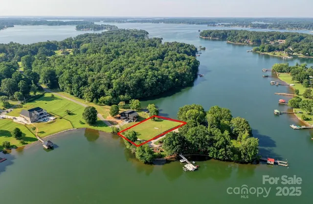 an aerial view of a house with outdoor space swimming pool