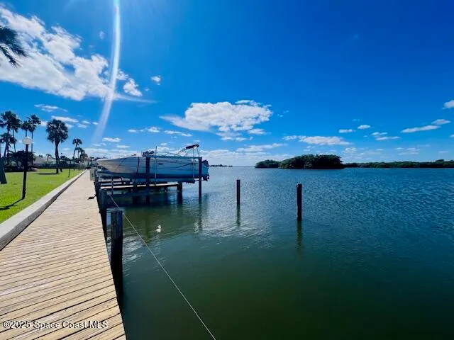 a view of a balcony with dining space