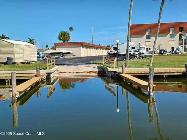 a view of a balcony with chairs