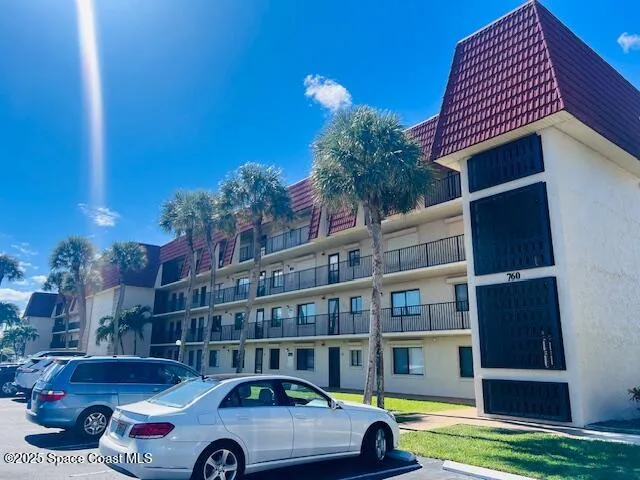 a front view of a house with swimming pool
