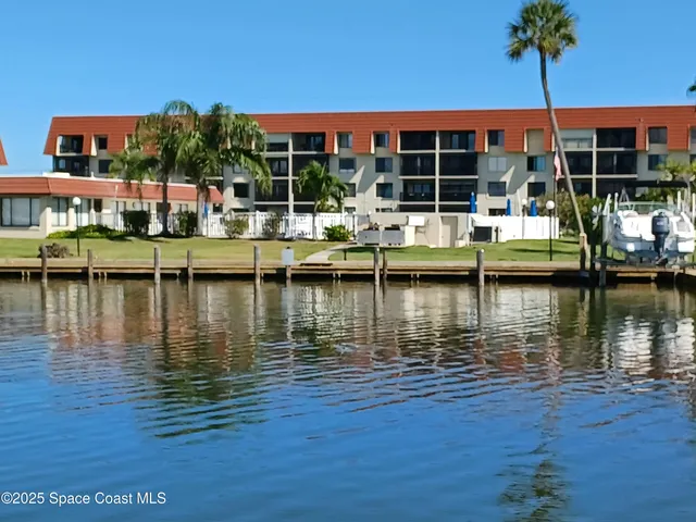 a view of house with swimming pool yard and outdoor seating