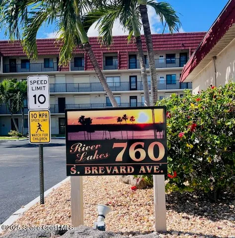 a view of a street sign of a building