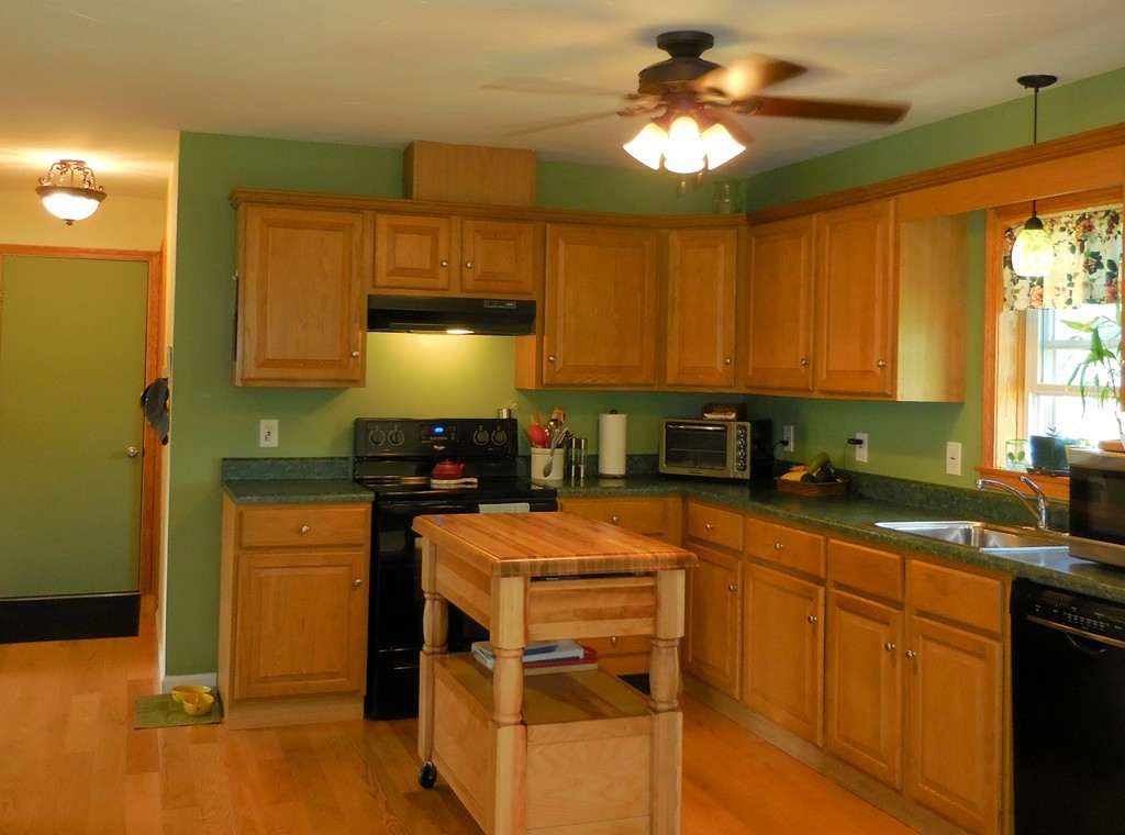 130 Plumtree Road Sunderland, MA 01375 - Photo 11 of 19 a kitchen with stainless steel appliances granite countertop a sink stove and refrigerator