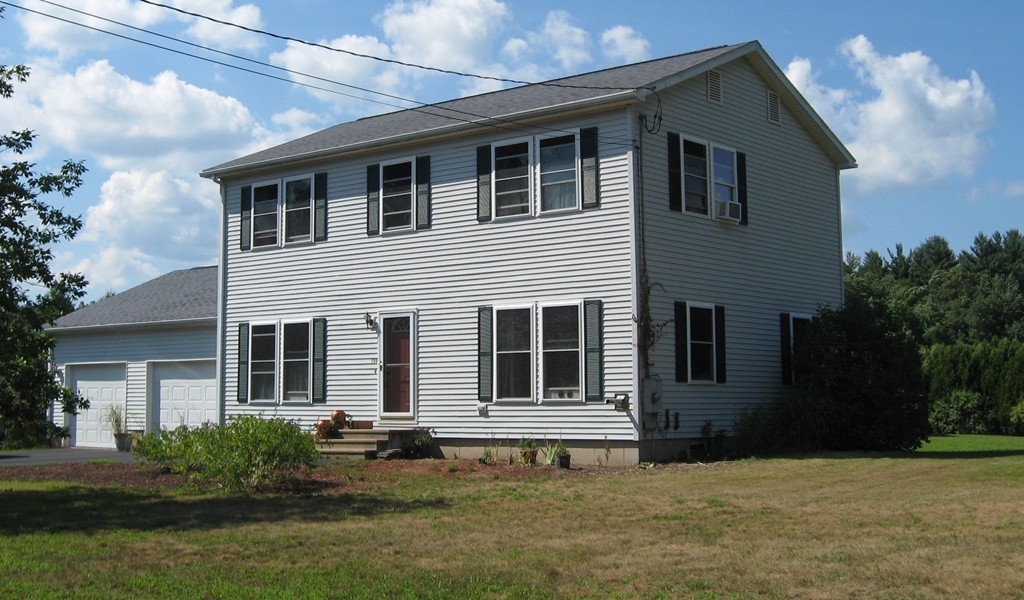 130 Plumtree Road Sunderland, MA 01375 - Photo 19 of 19 a front view of a house with a yard