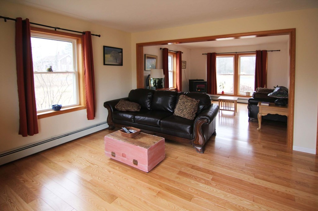 130 Plumtree Road Sunderland, MA 01375 - Photo 4 of 19 a living room with furniture and a large window