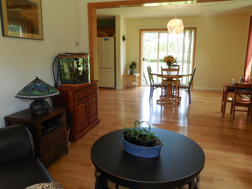 130 Plumtree Road Sunderland, MA 01375 - Photo 6 of 19 a living room with furniture and a wooden floor