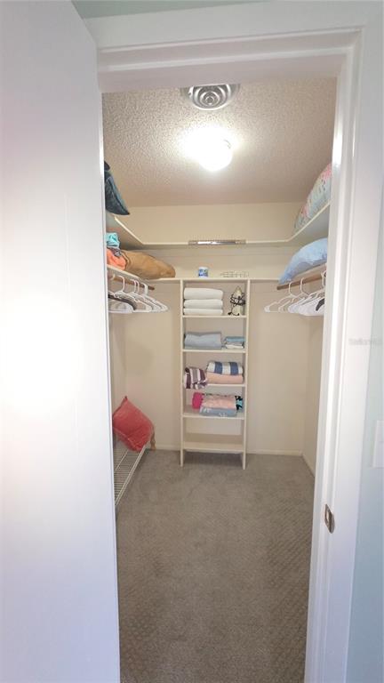 199 Caddy Road Rotonda West, FL 33947 - Photo 9 of 20 a storage room with washer and dryer