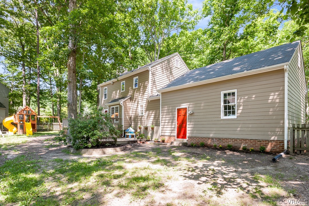 13815 Sterlings Bridge Road Midlothian, VA 23112 - Photo 27 of 27 a backyard of a house with yard and outdoor seating