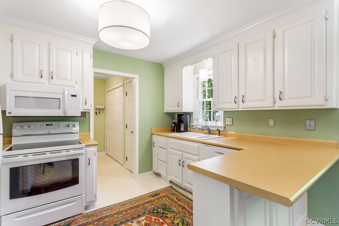 13815 Sterlings Bridge Road Midlothian, VA 23112 - Photo 10 of 27 a kitchen with stainless steel appliances a stove a sink and a refrigerator