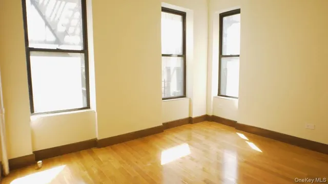 a kitchen with stainless steel appliances granite countertop a refrigerator and a stove