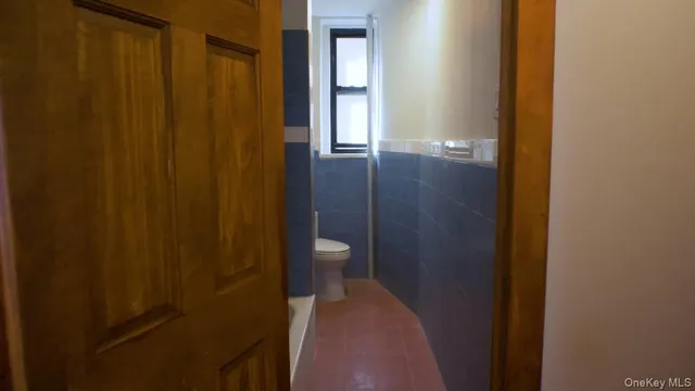 a bathroom with a sink and toilet