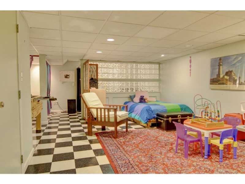 25 Bevelin Road Providence, RI 02906 - Photo 18 of 23 Den/Family/Great Room. Play room in Lower Level