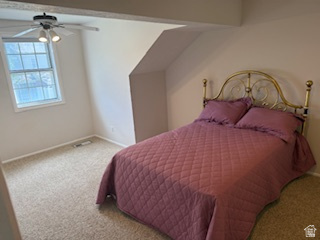254 Meadow Lane Centerville, UT 84014 - Photo 26 of 34 Carpeted room featuring a white-framed window, a ceiling fan with integrated lighting, and sloped ceiling details