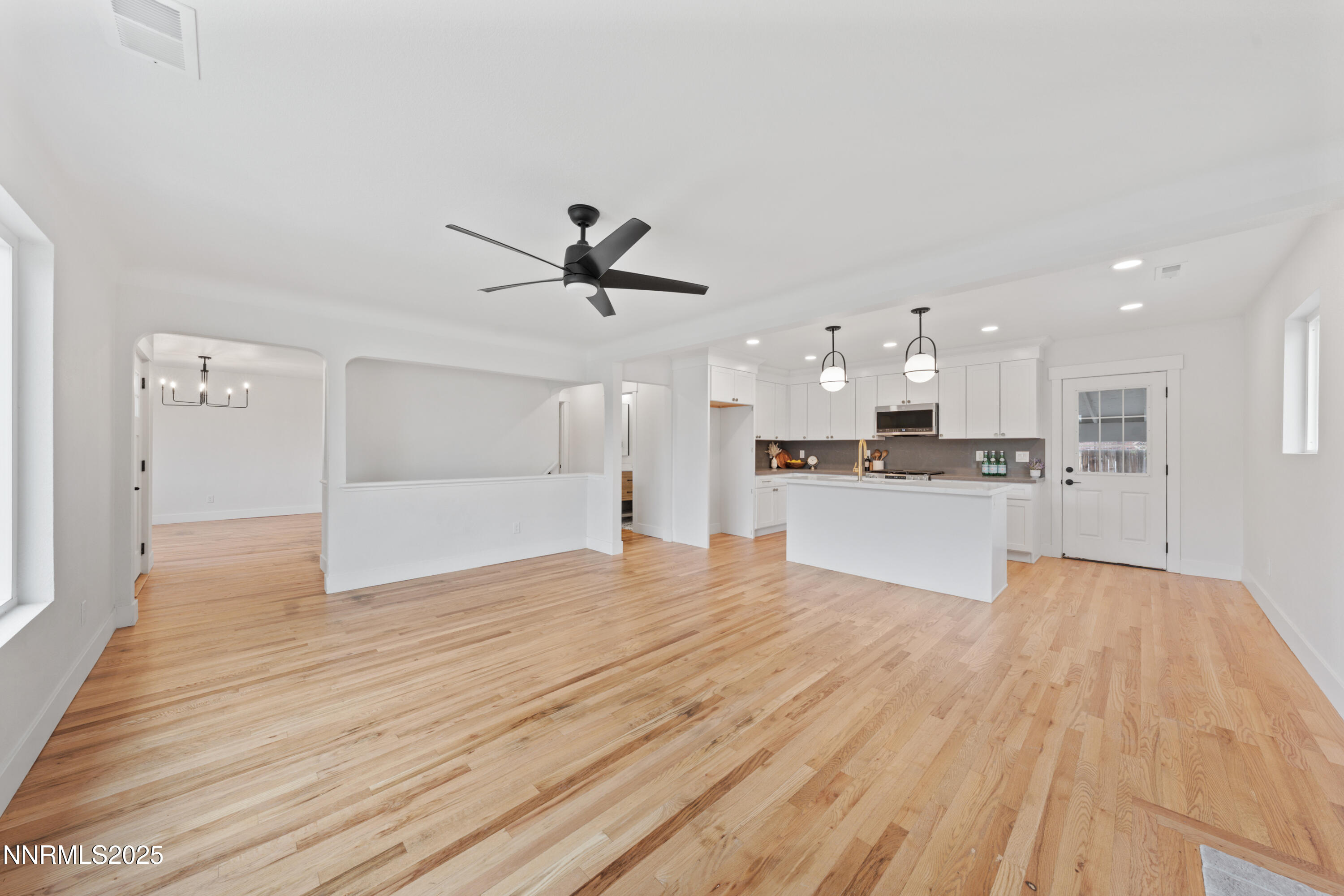 625 Hunter Lake Drive Reno, NV 89509 - Photo 5 of 65 a view of a kitchen with a sink and wooden floor