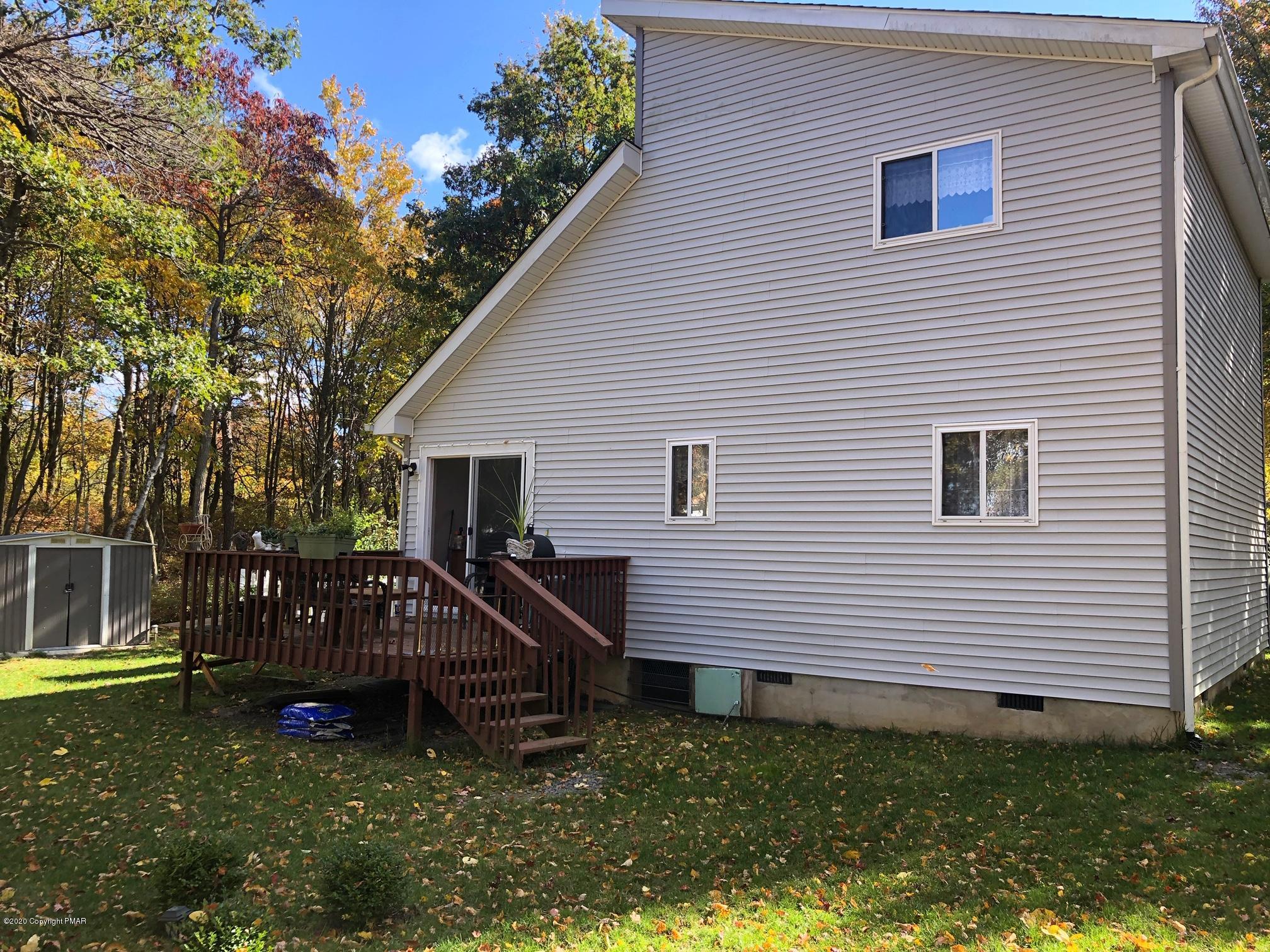 223 Sage Road Long Pond, PA 18334 - Photo 3 of 28 a view of a house with a yard