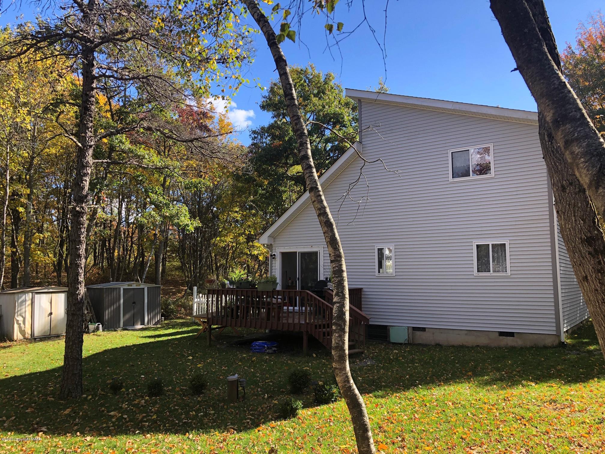 223 Sage Road Long Pond, PA 18334 - Photo 4 of 28 a house view with a garden space