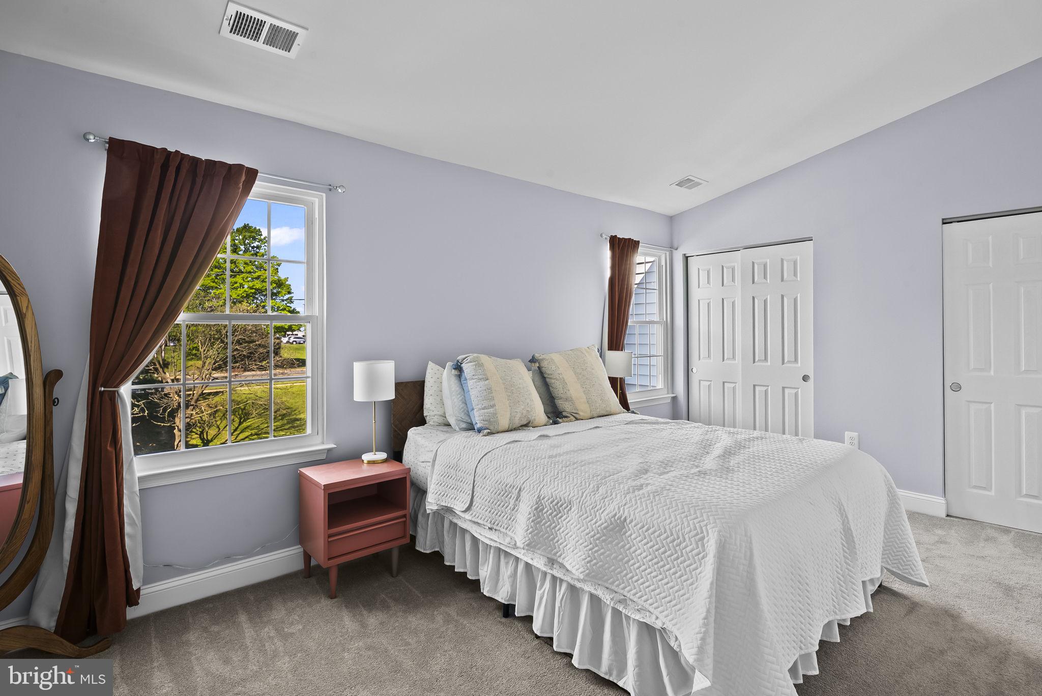 25 Hunters Gate Court Silver Spring, MD 20904 - Photo 19 of 32 a bedroom with a bed and a window