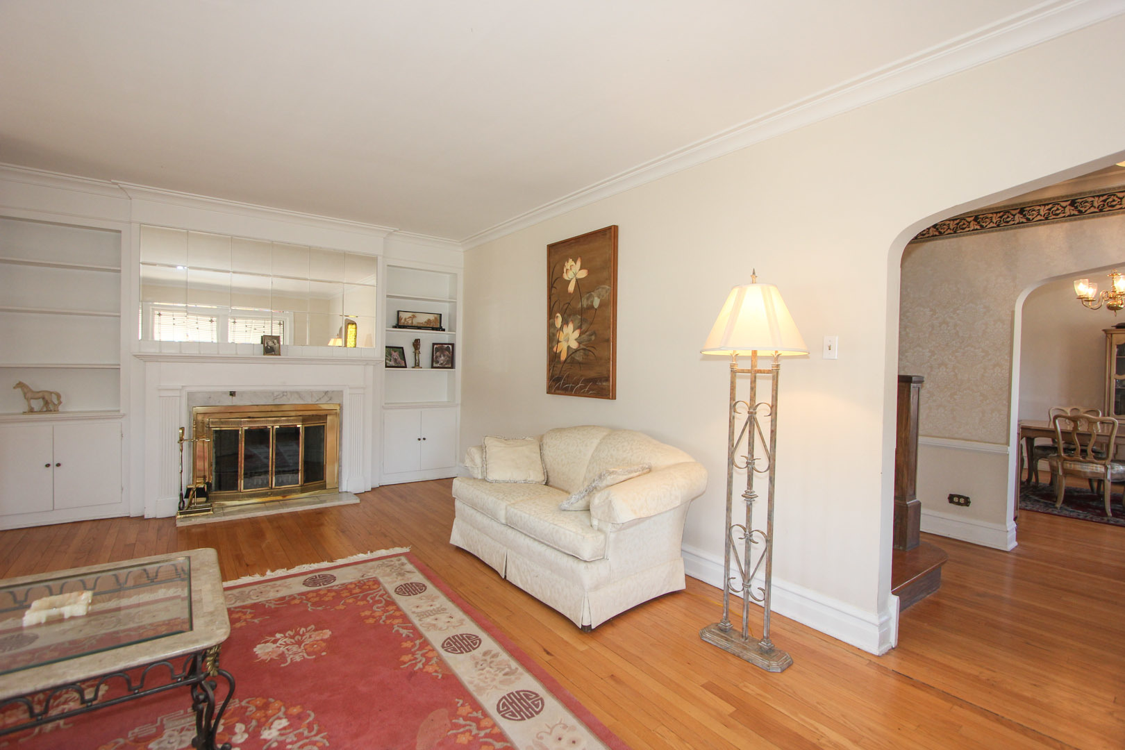 7610 Washington Boulevard River Forest, IL 60305 - Photo 15 of 30 a living room with furniture and a fireplace