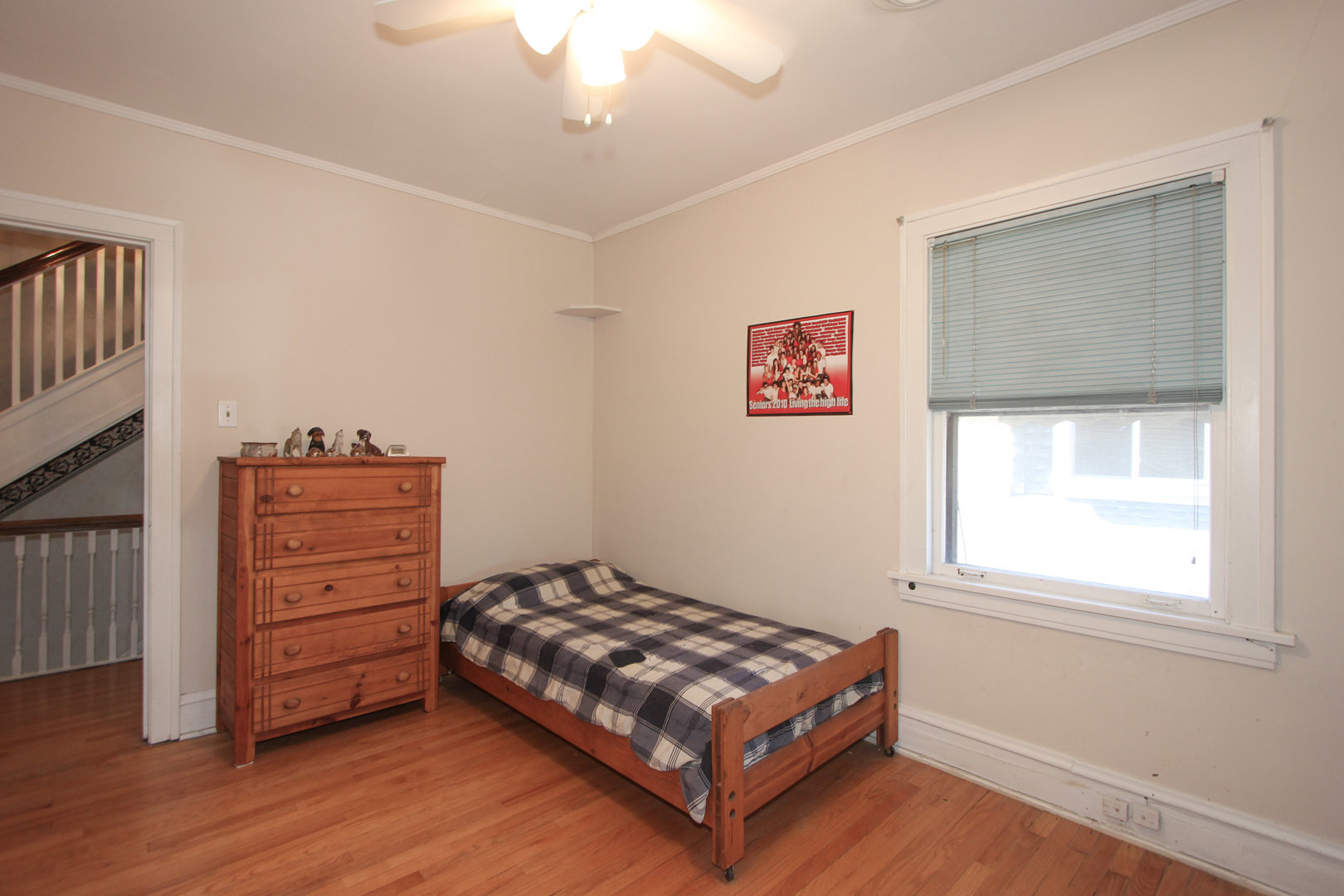 7610 Washington Boulevard River Forest, IL 60305 - Photo 17 of 30 a room with a bed and wooden floor