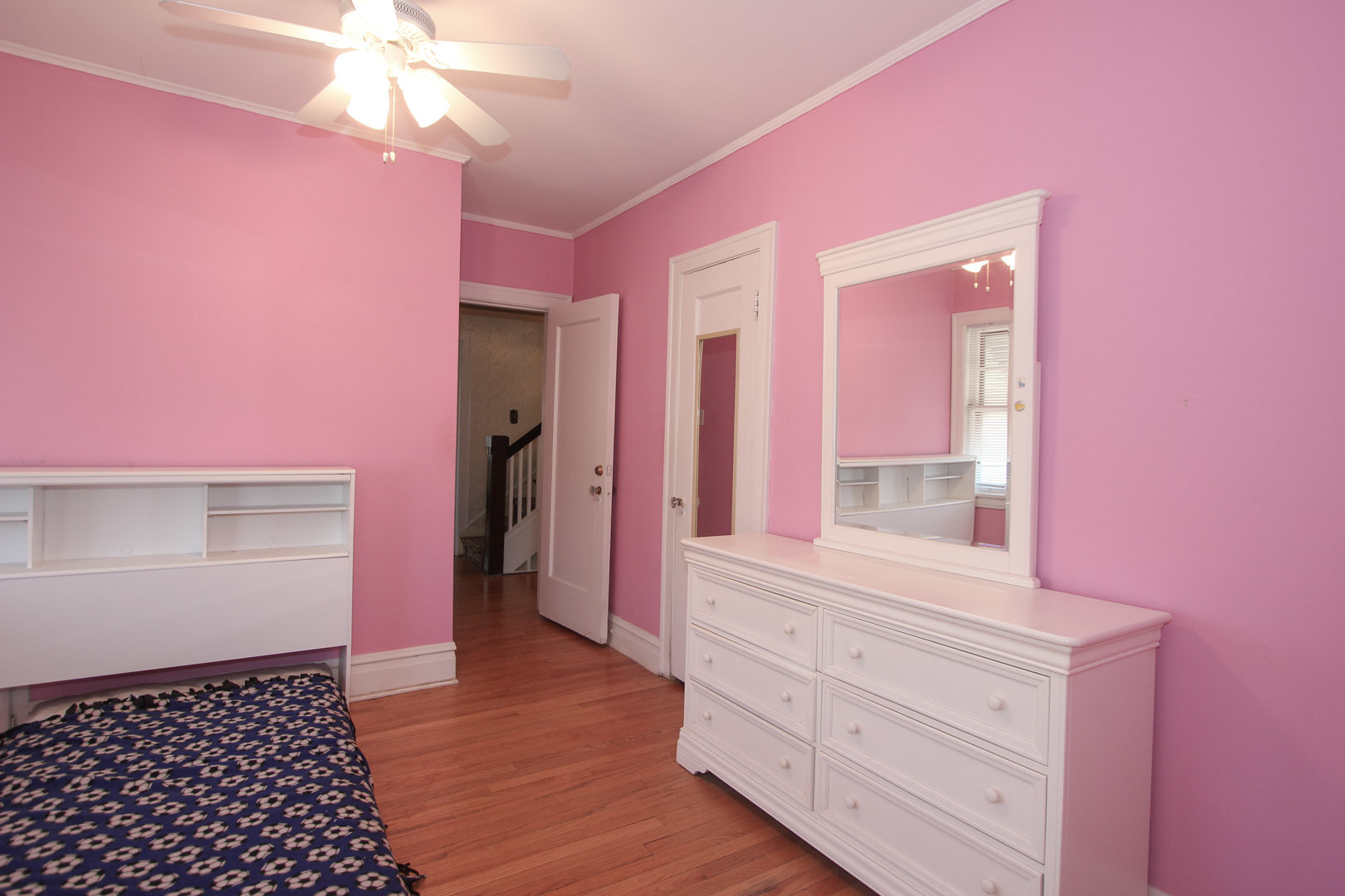 7610 Washington Boulevard River Forest, IL 60305 - Photo 18 of 30 a view of a hallway with wooden floor and cabinet